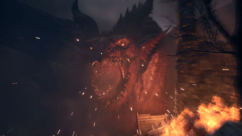 The Dragon breathing fire during a night attack in Dragon's Dogma 2